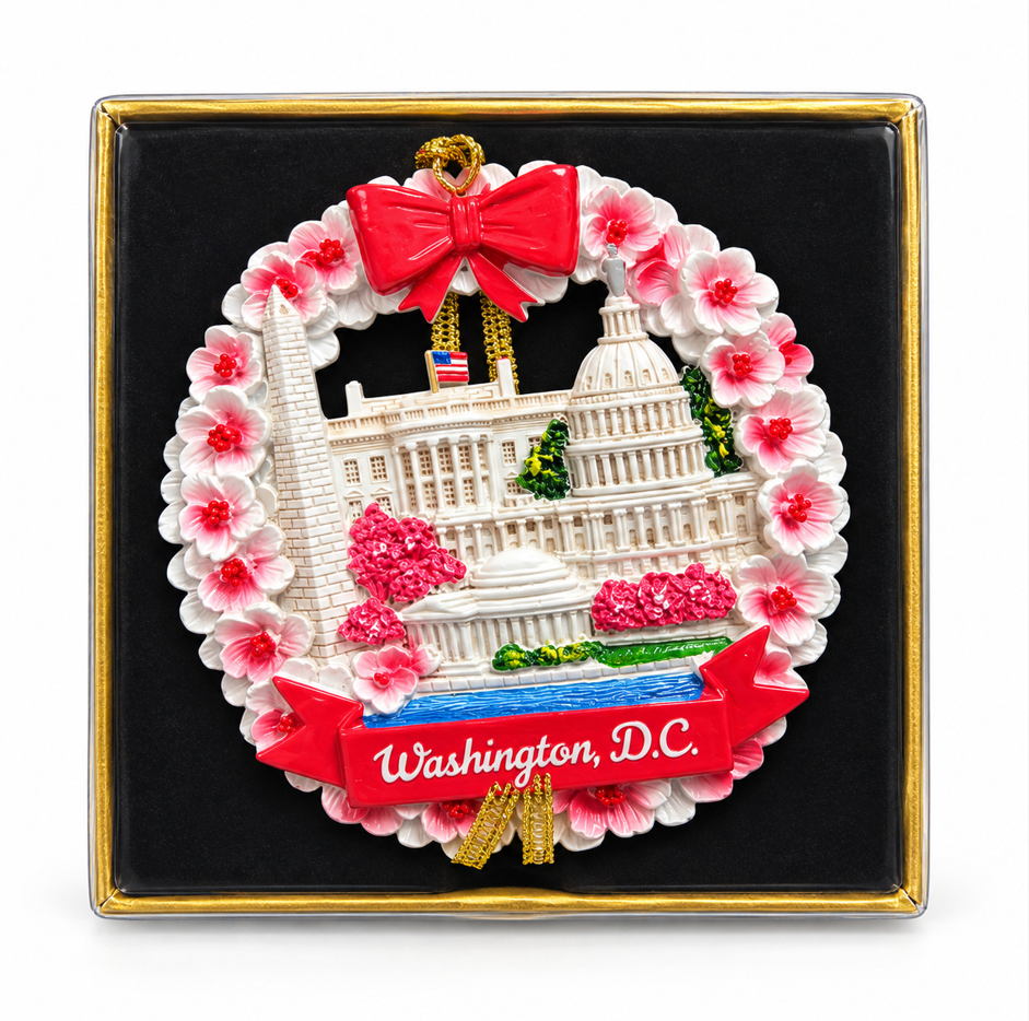 Ceramic Washington, D.C. ornament with red bow and pink blossoms in gift box