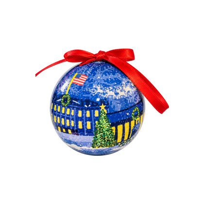 Blue Christmas ball ornament with red ribbon bow and Washington D.C. skyline design