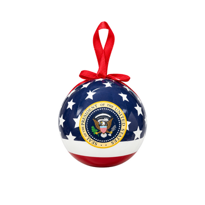 Patriotic ball Christmas ornament with red hanging ribbon and blue star flag design