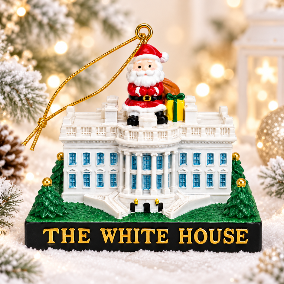 Ceramic house ornament with rooftop Santa and gold "THE WHITE HOUSE" base, on snow