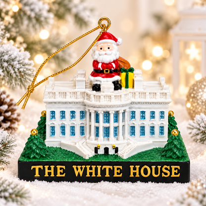 Ceramic house ornament with rooftop Santa and gold "THE WHITE HOUSE" base, on snow